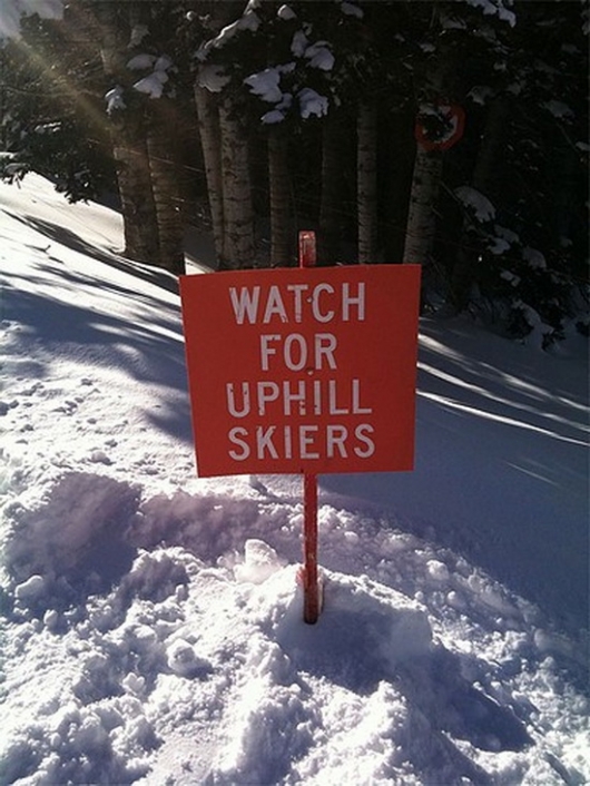Watch for uphill skiers