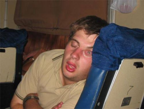 Guy sleeping with an open eye